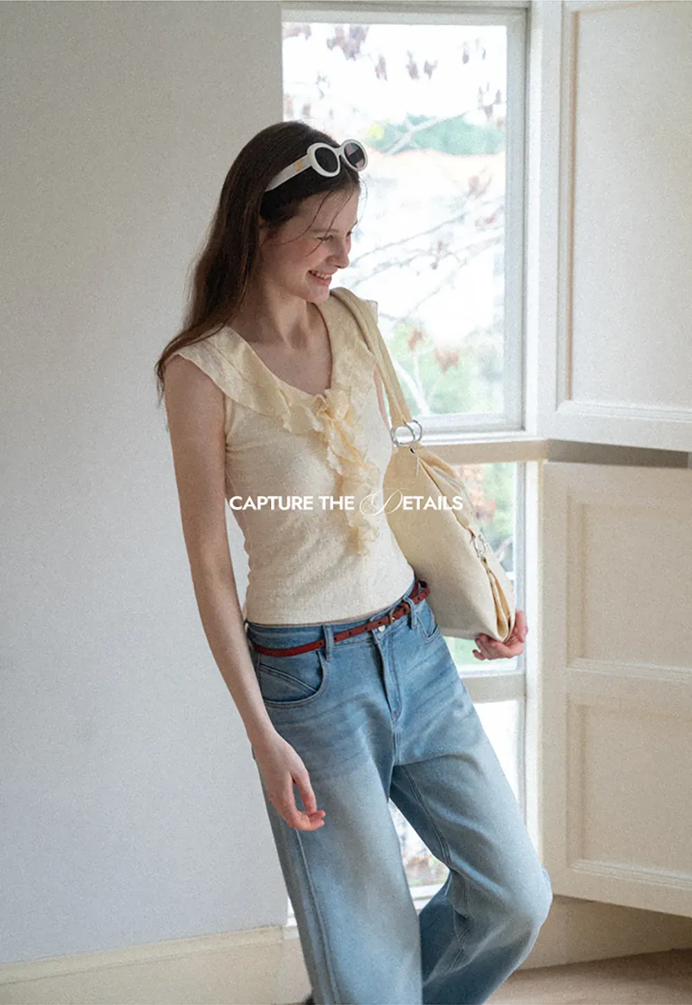 Sleeveless Top with Ruffled V Neck and Floral Detail