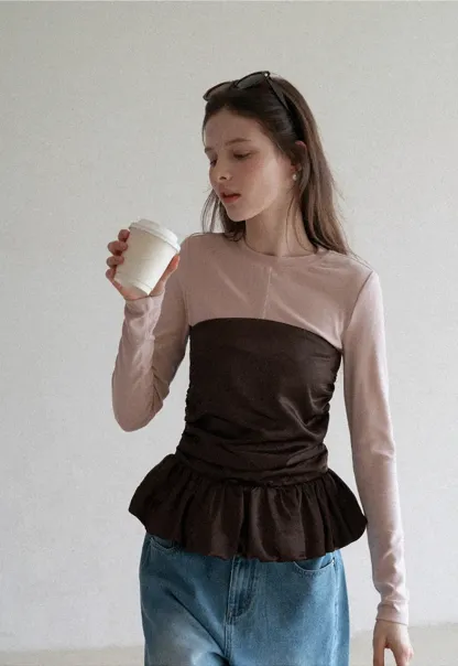 Long sleeve top with ruffled hem and layered design