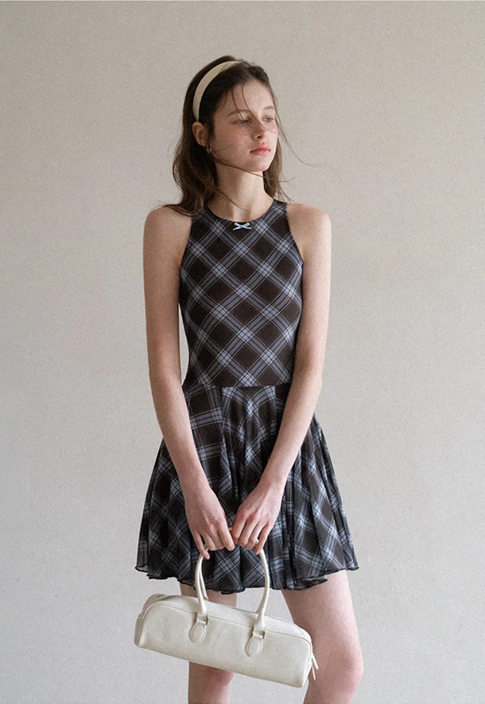 Plaid sleeveless dress with flared skirt