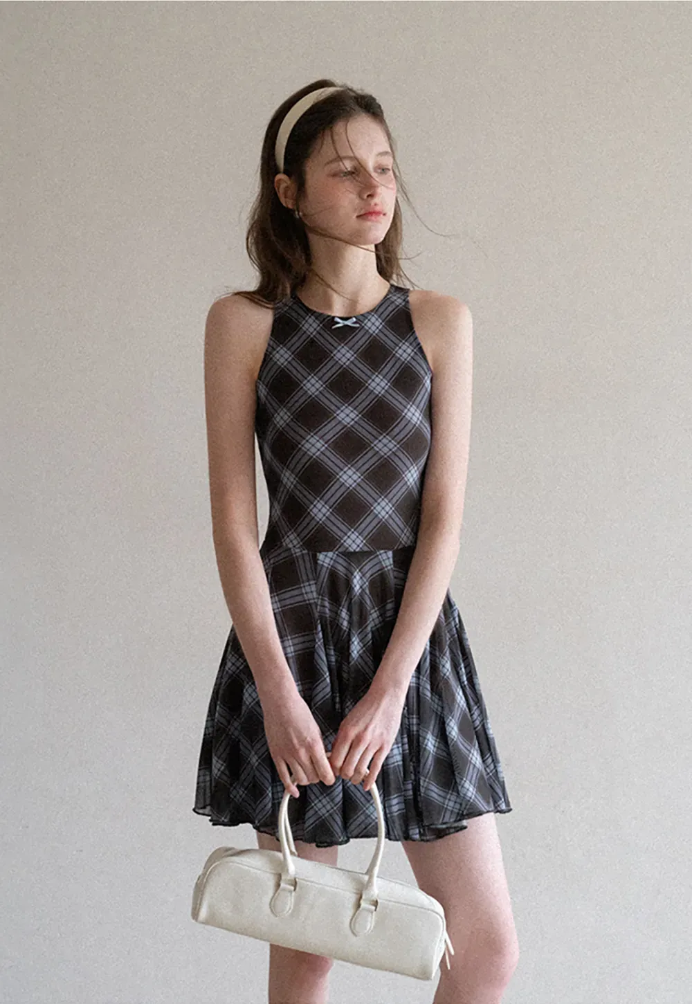 Plaid sleeveless dress with flared skirt