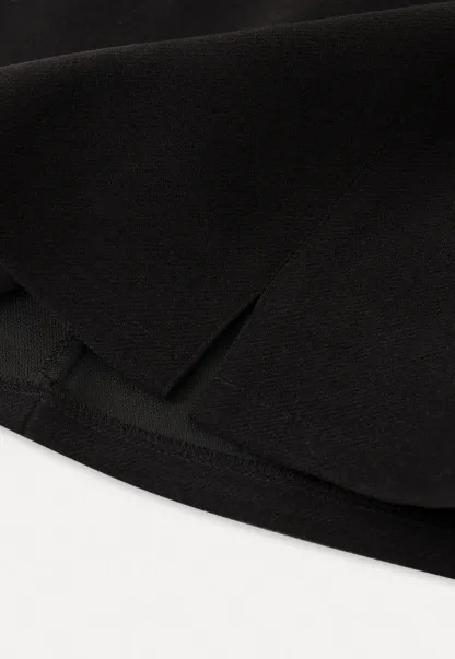 Elegant Mini Skirt with Front Slit and Button Detail