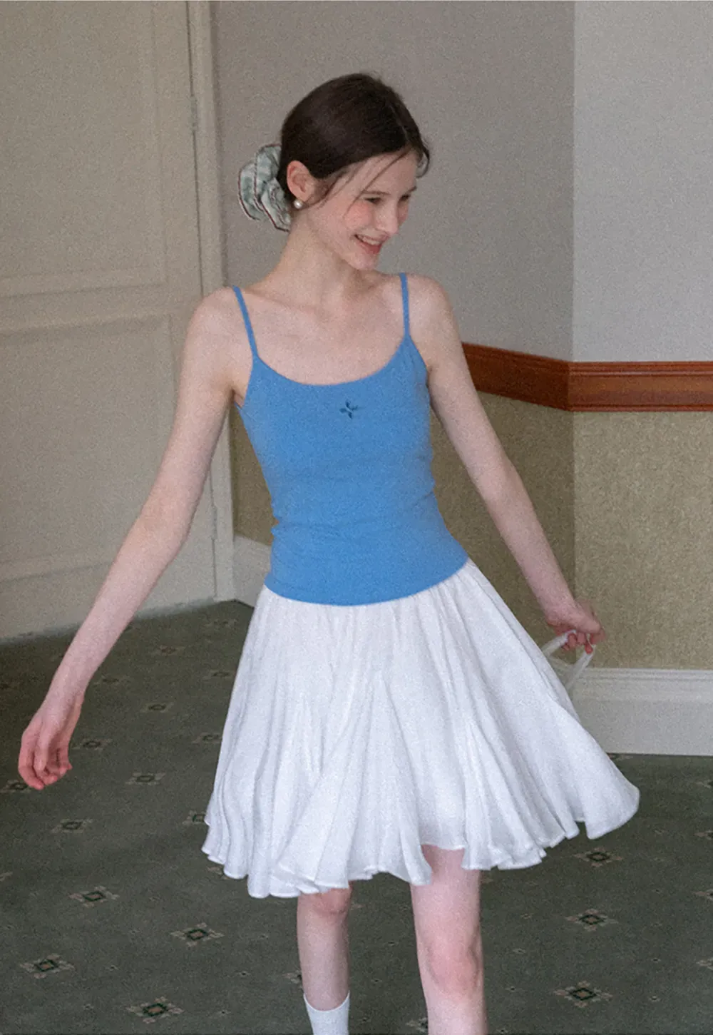 Gray tank top with small embroidered cross detail