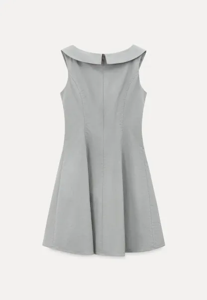 Sleeveless dress with Peter Pan collar and bow detail