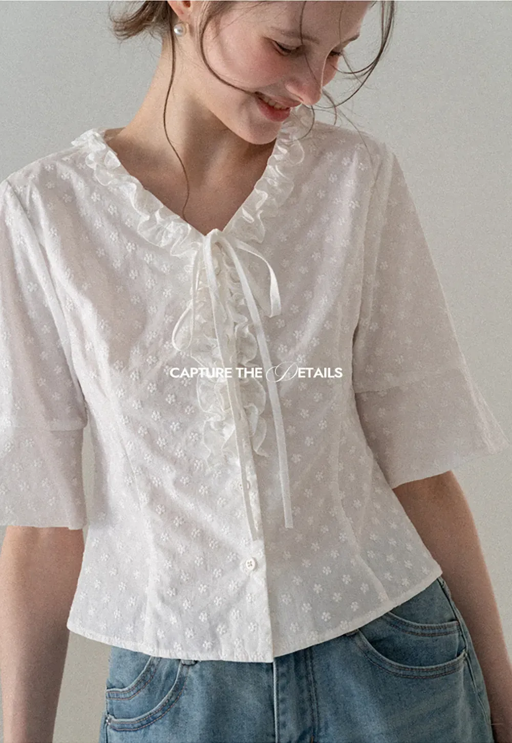 V neck blouse with lace trim and tie front