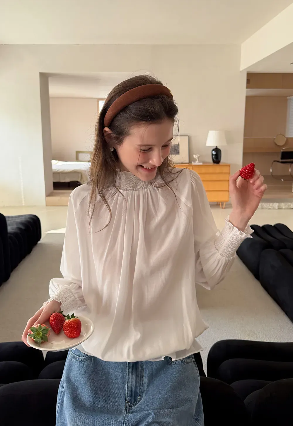 Elegant High Neck Blouse with Ruffled Cuffs and Hem