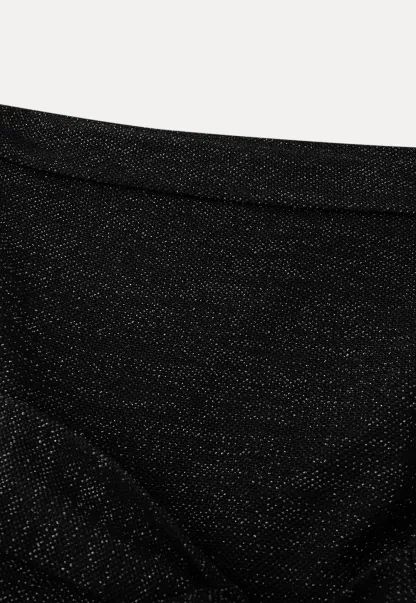 Elegant strapless midi dress with flowing skirt and textured fabric