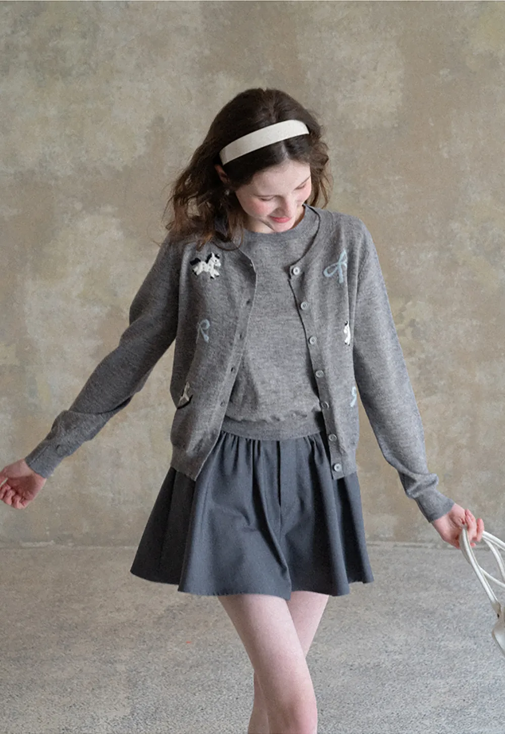 Woolen knit sweater with horse and bow motifs