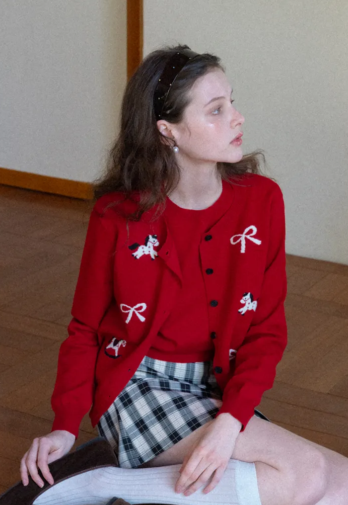 Woolen knit sweater with horse and bow motifs
