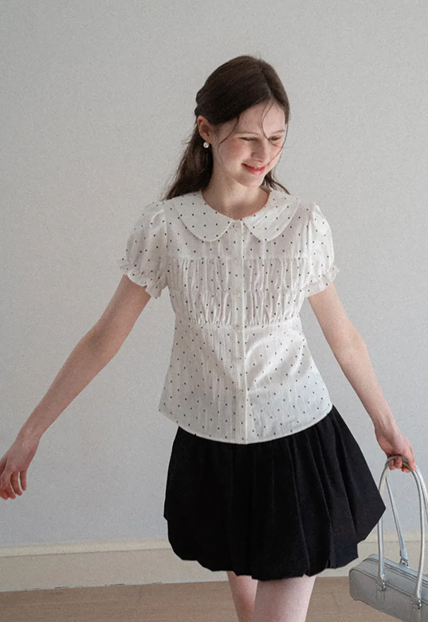 Polka dot shirt with ruffled sleeves and Peter Pan collar