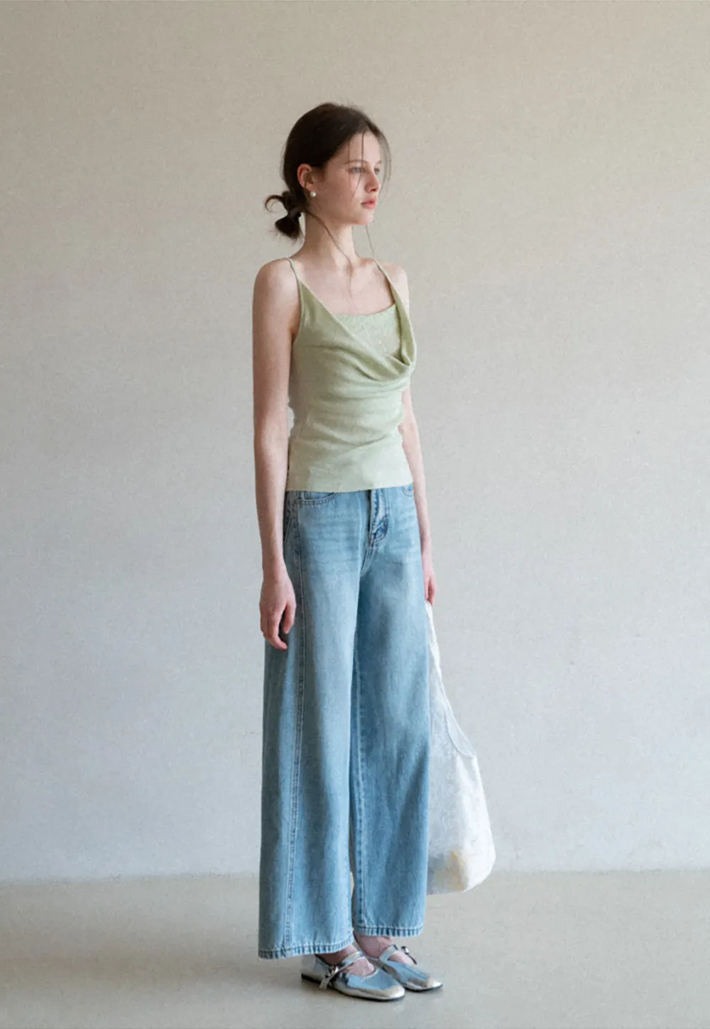 Silk-like tank top with thin straps and draped neckline