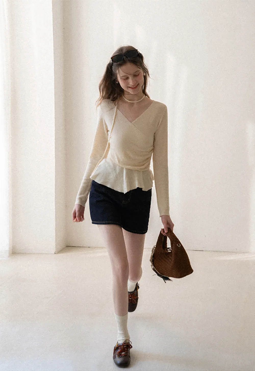 Long sleeve wrap knit sweater with ruched detail