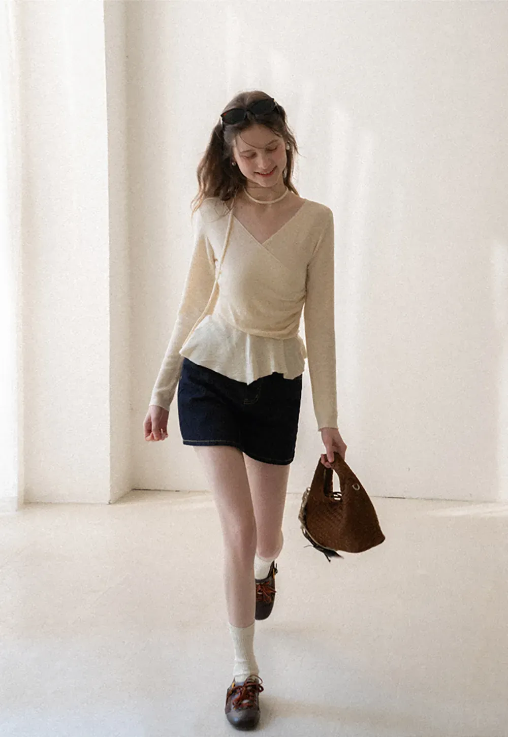 Long sleeve wrap knit sweater with ruched detail