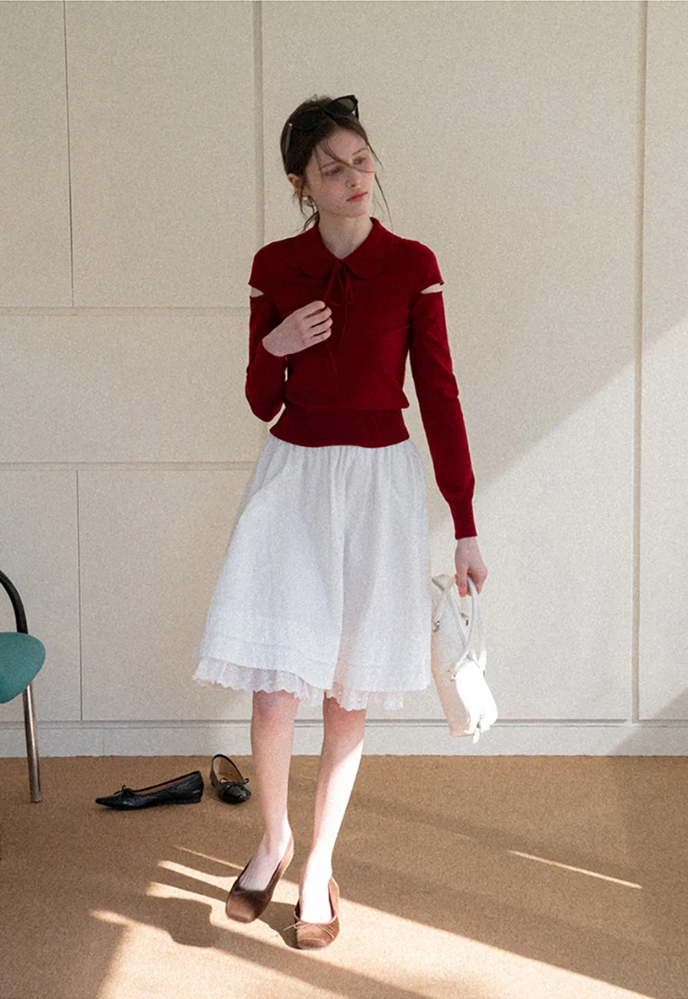 Elegant Knit Sweater with Bow Detail and Cutout Sleeves