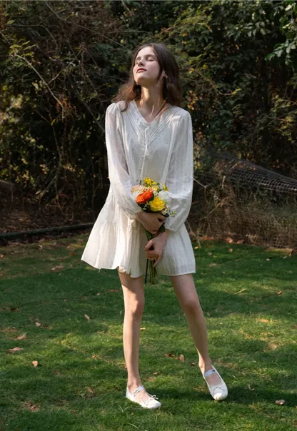 V neck long sleeve tiered dress with lace trim