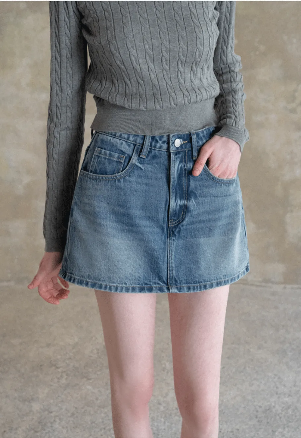 Denim Mini Skirt with Front Pocket and Frayed Hem