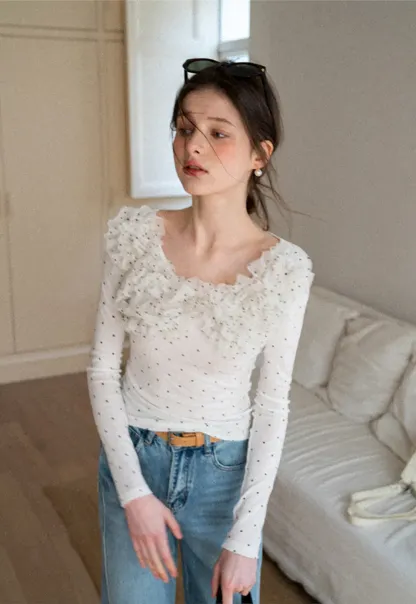 Polka dot long sleeve top with ruffled neckline