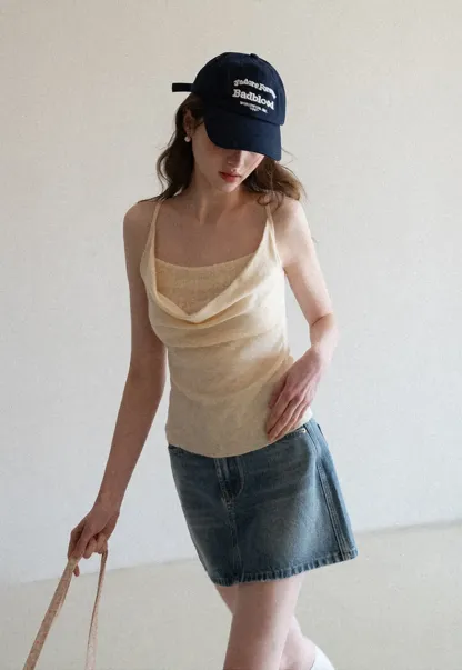 Silk-like tank top with thin straps and draped neckline