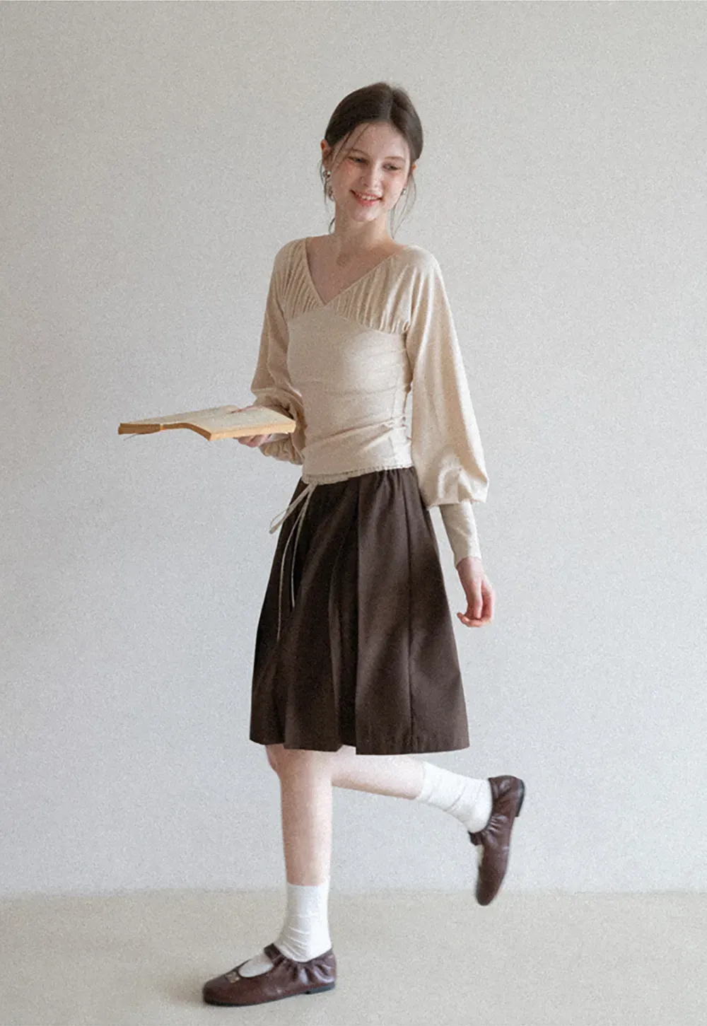 V neck long sleeve top with ruched detail