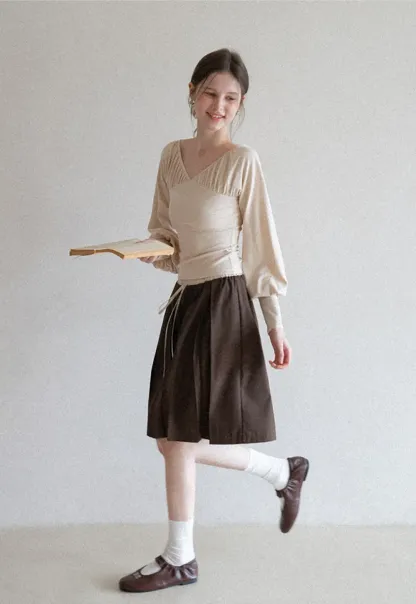 V neck long sleeve top with ruched detail