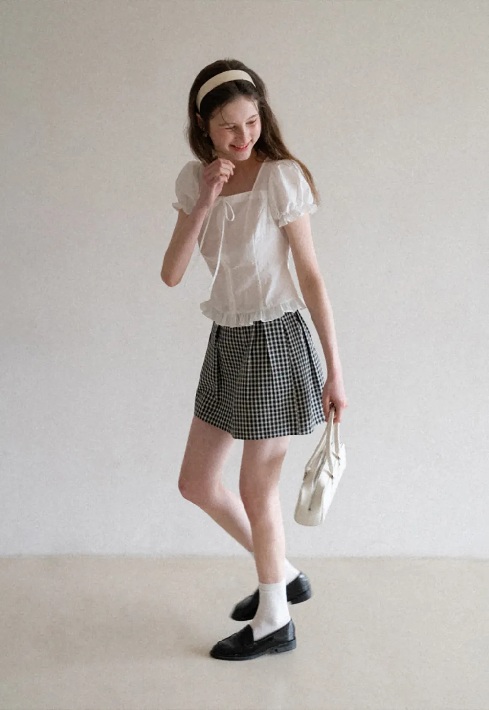 Square neck puff sleeve blouse with ruffle hem