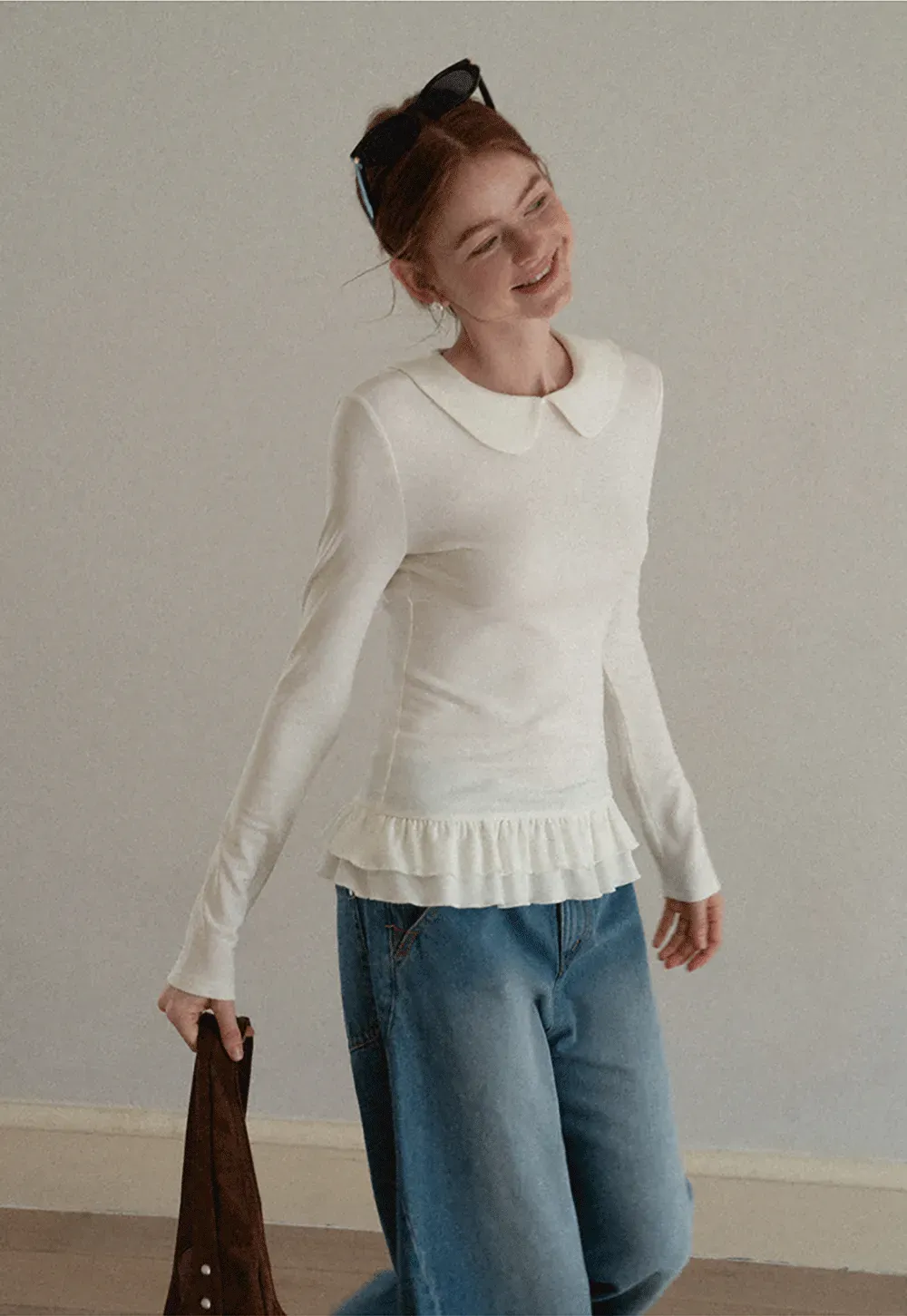 Elegant Long Sleeve Top with Ruffled Hem and Collar Design