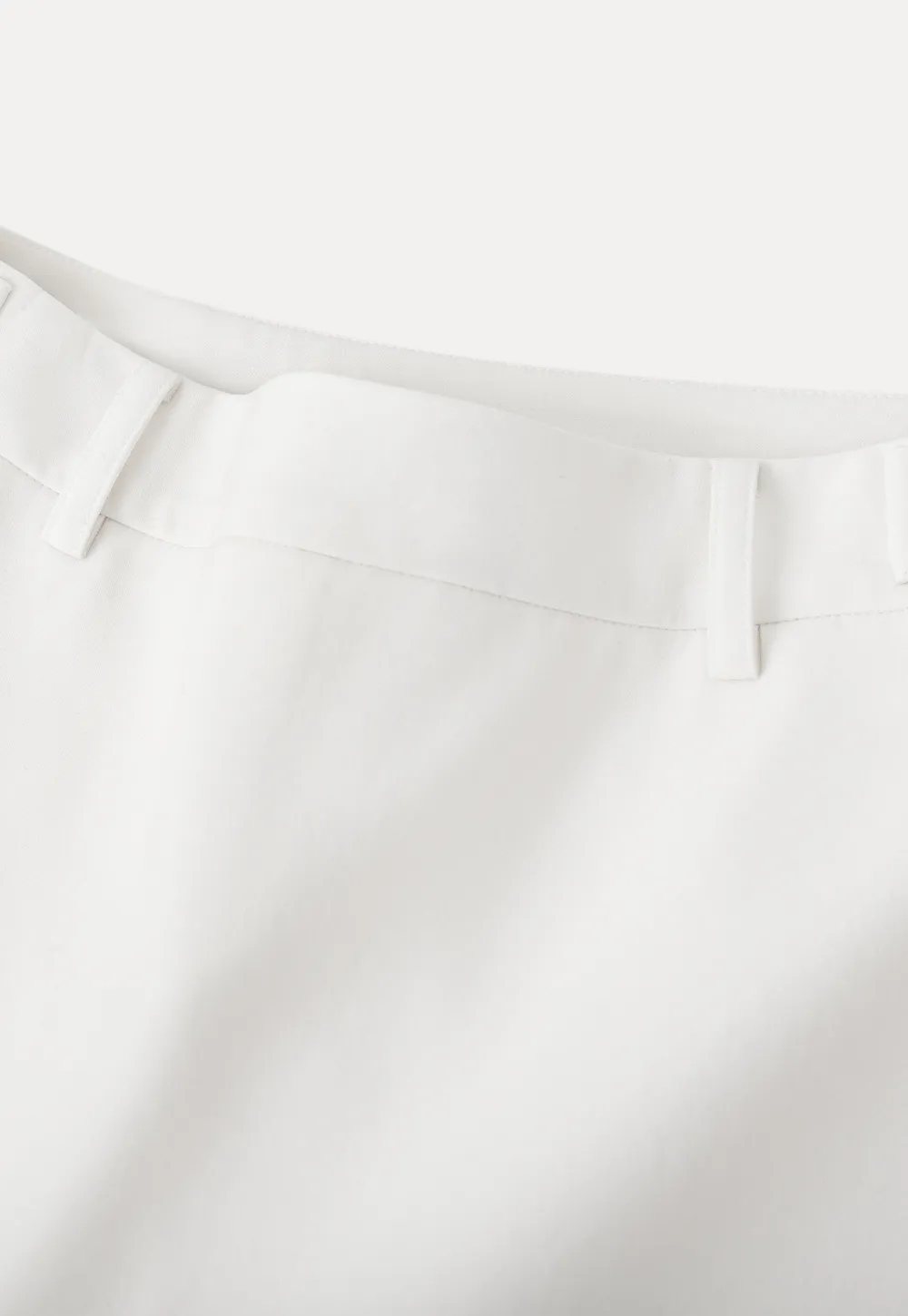 Elegant Pleated Mini Skirt with Asymmetrical Hem