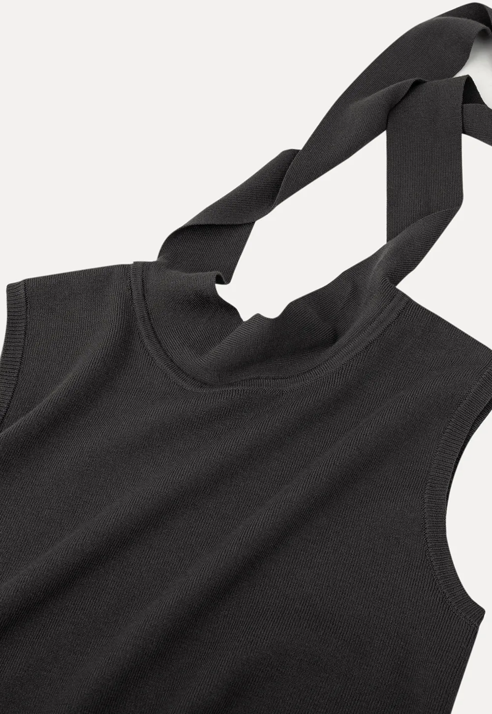 Sleeveless high neck knit top with side tie detail