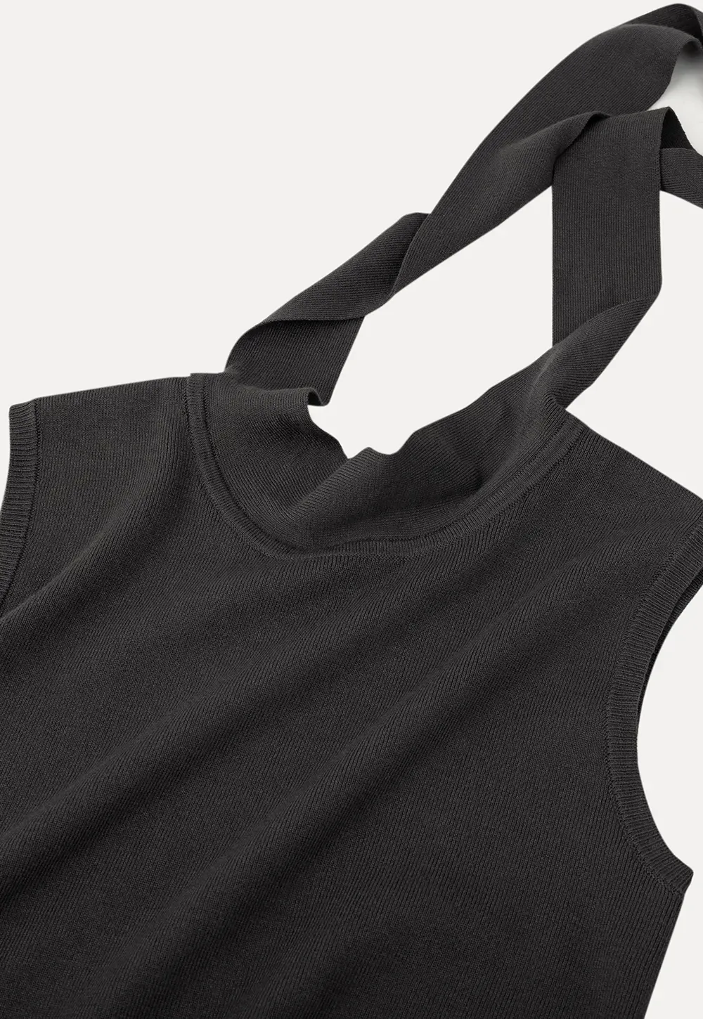 Sleeveless high neck knit top with side tie detail