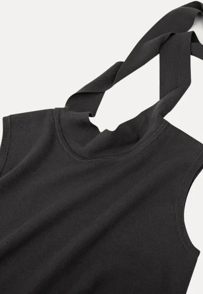 Sleeveless high neck knit top with side tie detail