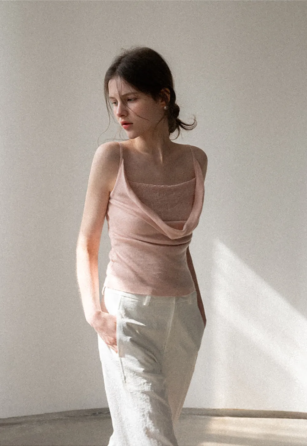 Silk-like tank top with thin straps and draped neckline