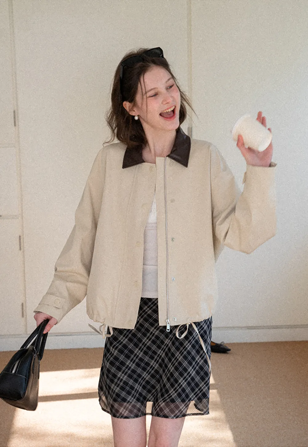 Short jacket with contrast collar and front buttons