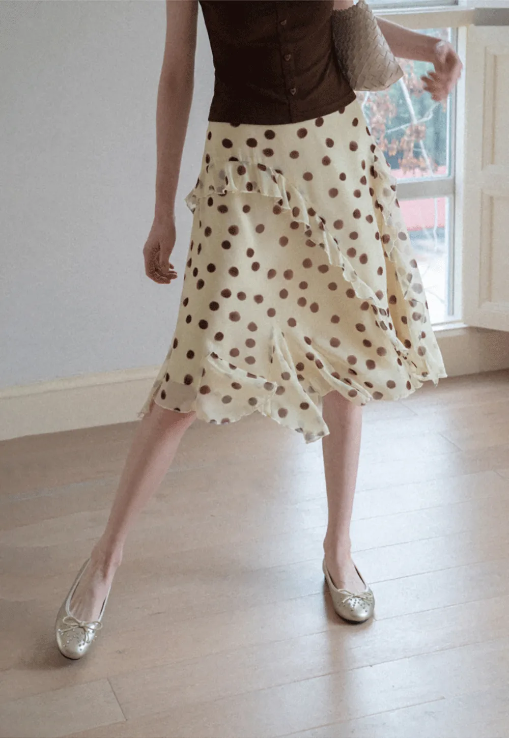 Polka dot ruffled asymmetrical midi skirt