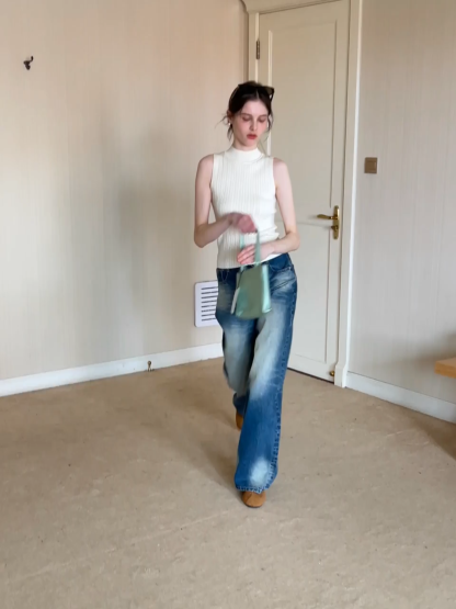 Cable Knit Sleeveless Top with High Neck Design