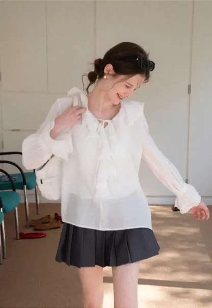 Elegant Blouse with Ruffled Neckline and Flared Sleeves