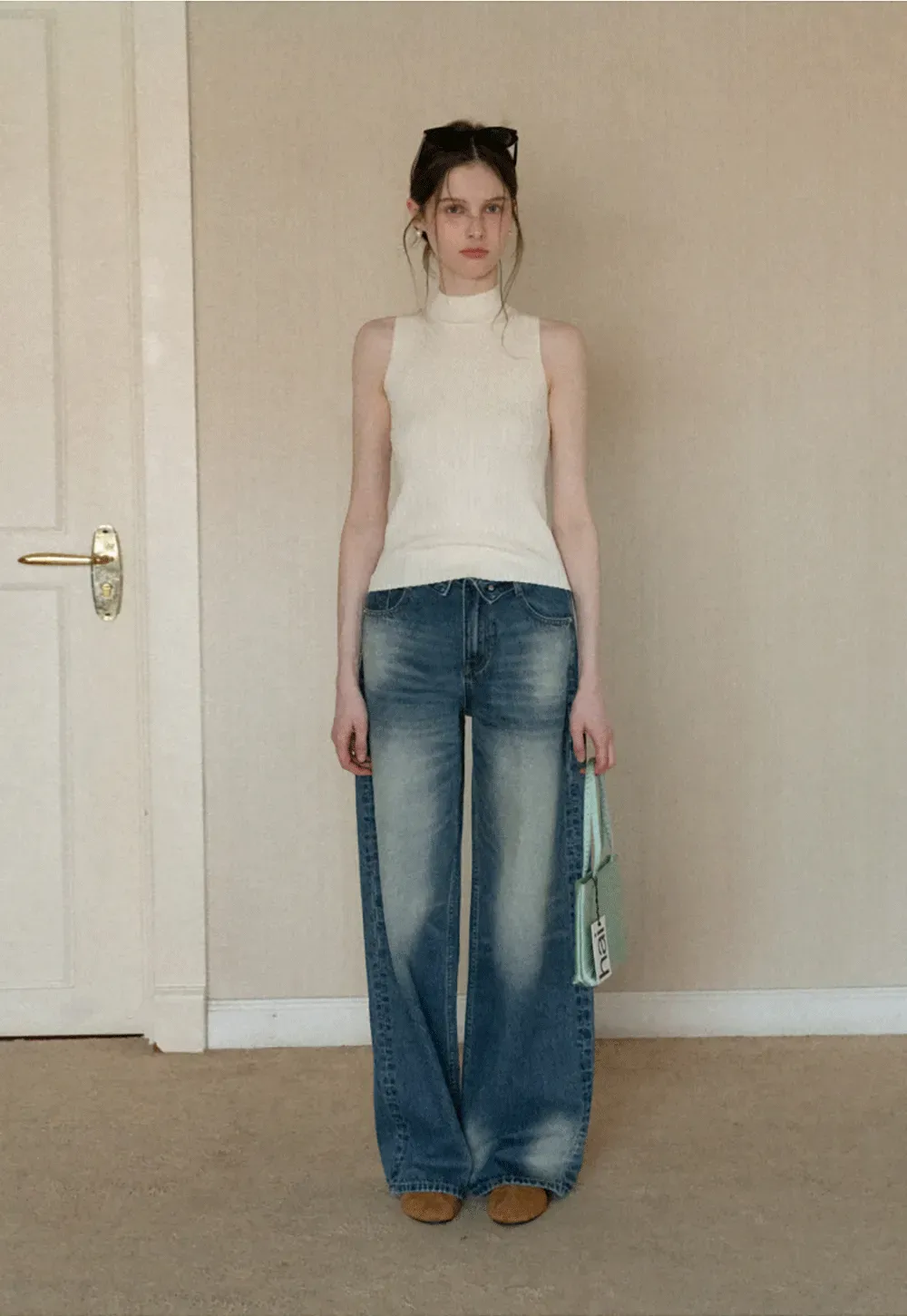 Wide leg high waist denim jeans with faded wash design