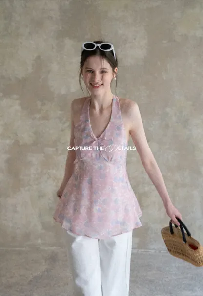 Woolen knit sweater with tie front and floral tank top