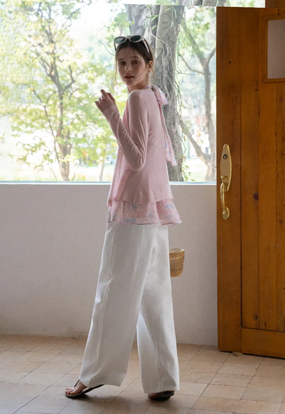 Woolen knit sweater with tie front and floral tank top