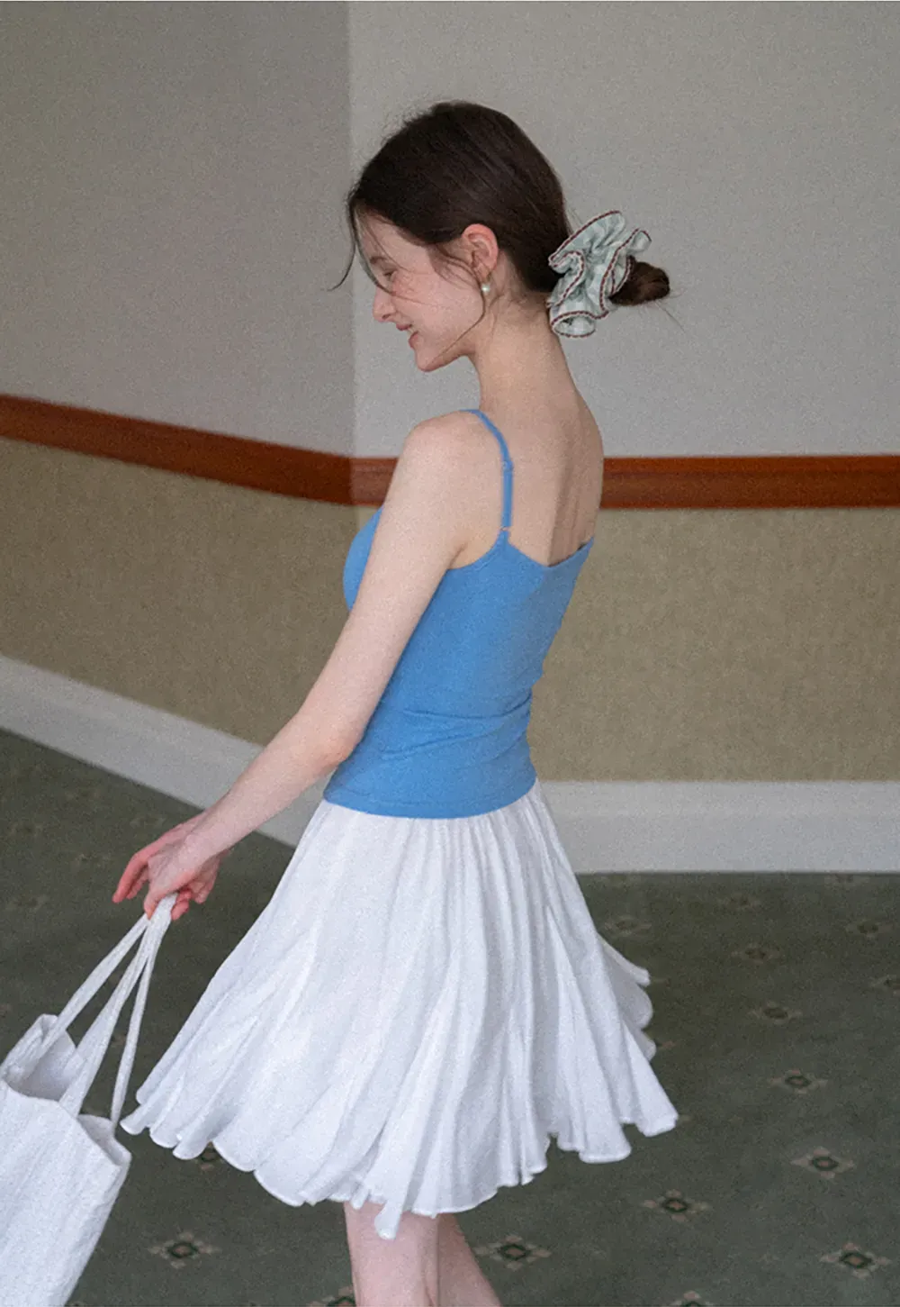 Gray tank top with small embroidered cross detail