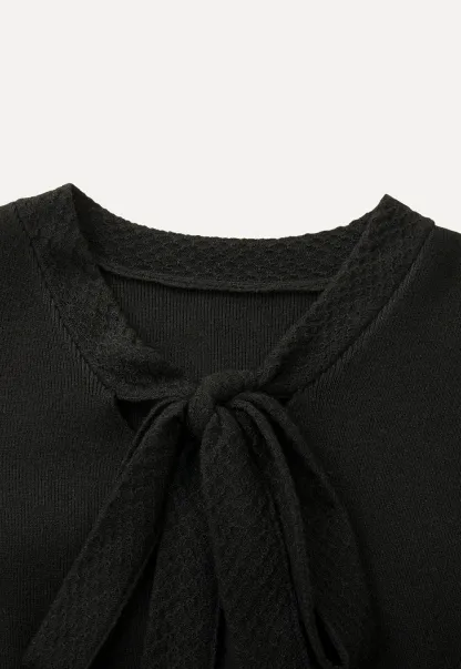 Elegant Black Top with Bow Detail Wide Leg Jeans Set