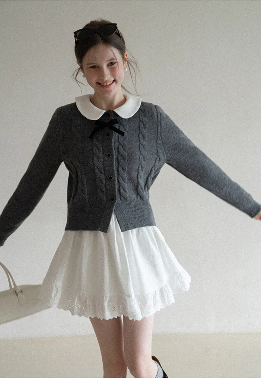 Elegant Cable Knit Cardigan with Bow Detail