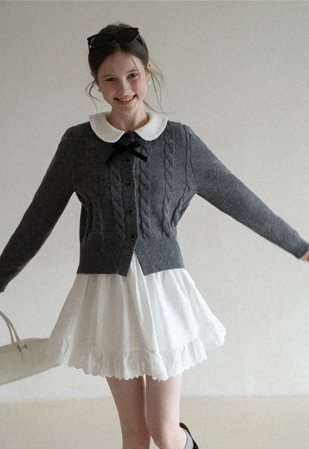 Elegant Cable Knit Cardigan with Bow Detail