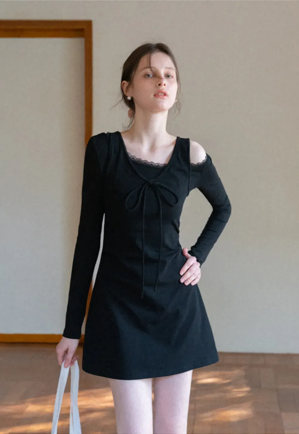 Sleeveless dress with front tie detail and t shirt