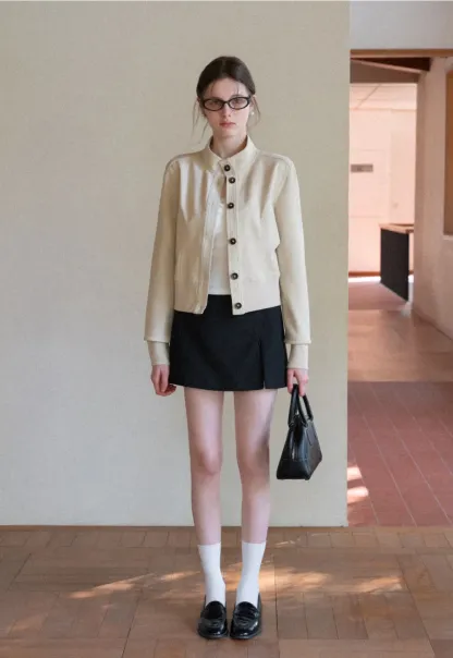 Short jacket with button front and ribbed cuffs