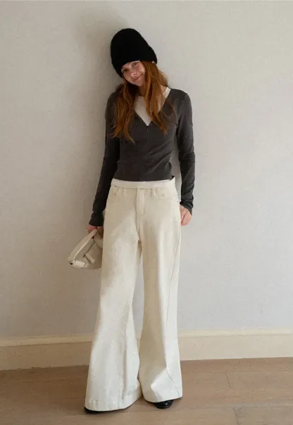 Long sleeve crop top with round neck and hem stitching design