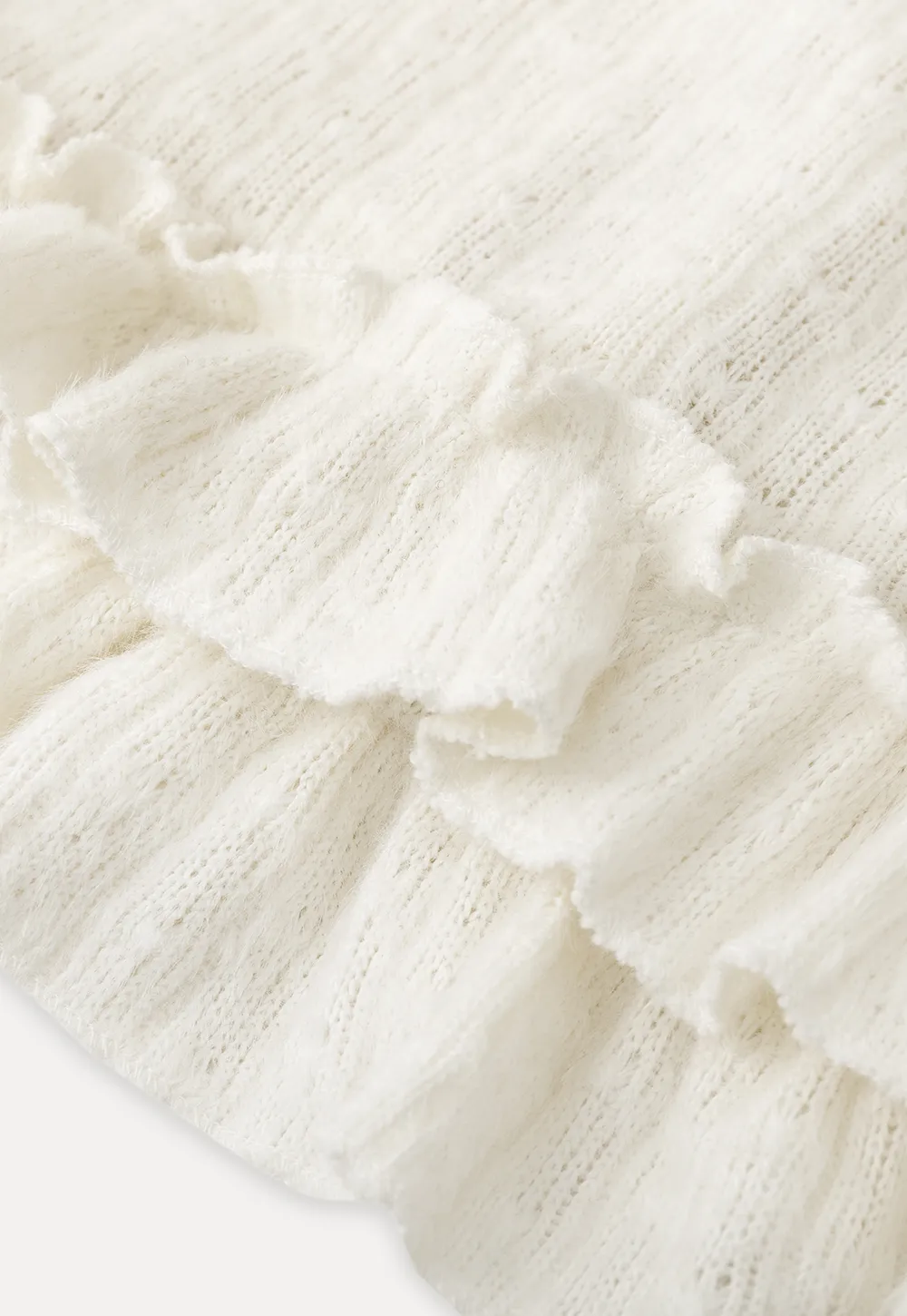 floral lace top with puffed sleeves and ruffled hem