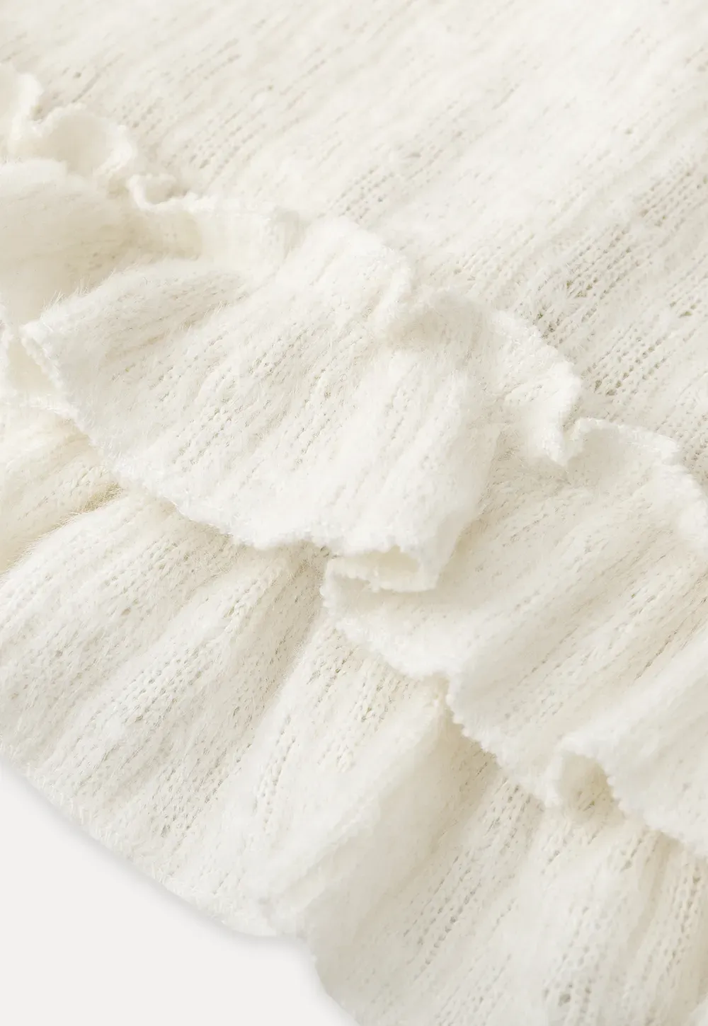 floral lace top with puffed sleeves and ruffled hem