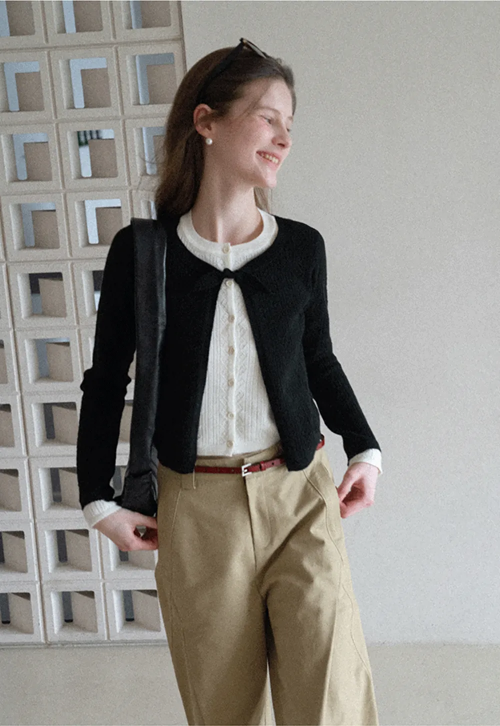 Elegant Knit Cardigan with Bow Detail and Ribbed Texture