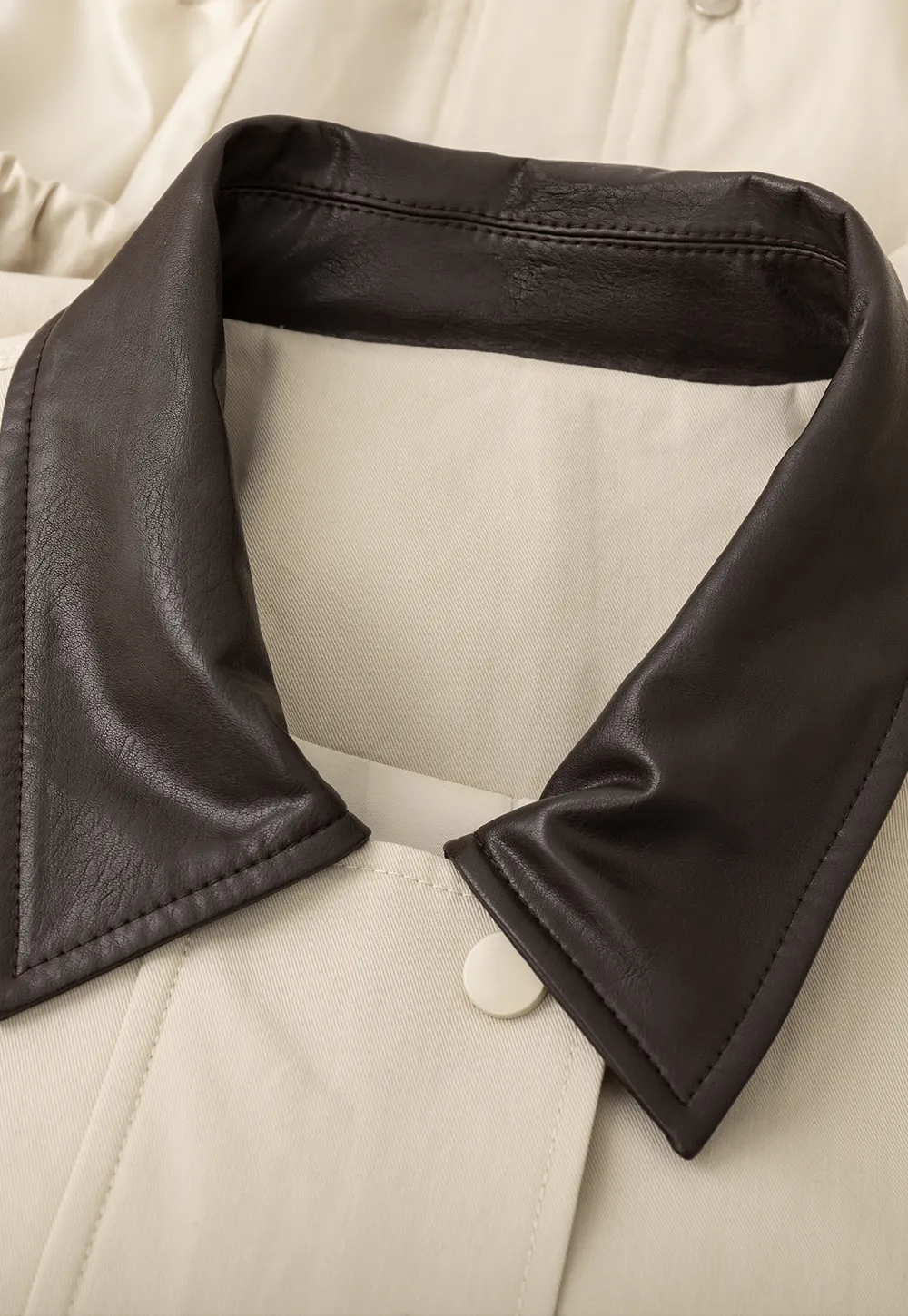 Short jacket with contrast collar and front buttons