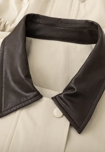 Short jacket with contrast collar and front buttons