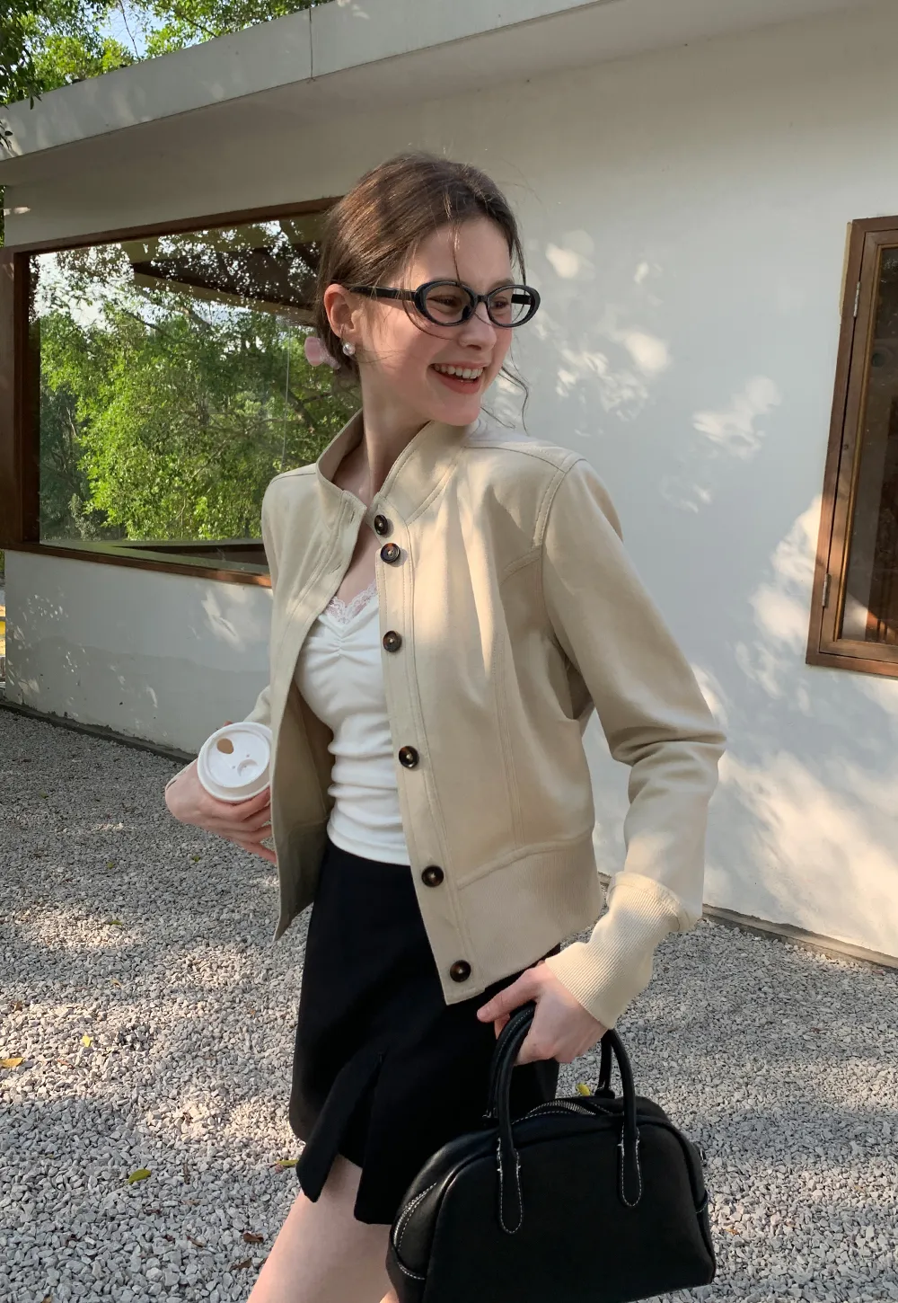 Short jacket with button front and ribbed cuffs